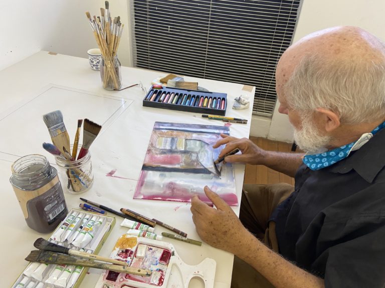 Rorke working on his watercolour monotypes at the David Krut Workshop