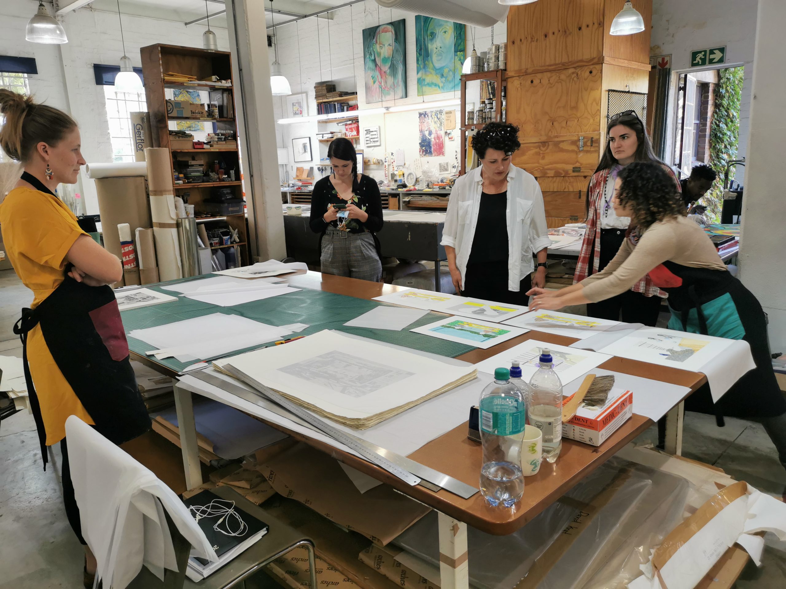 Looking at Matty Monethi's works with the team (from left: Sarah Judge, Amé Bell, Anthea Buys, Melissa Waters, Kim-Lee Loggenberg)